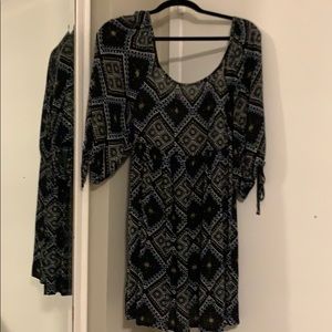 A black with pattern detailing dress